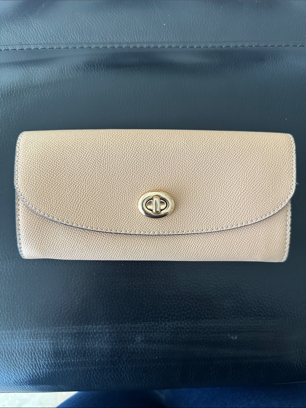Coach Beige Pebbled Leather Turn-Lock Wallet with Gold Hardware